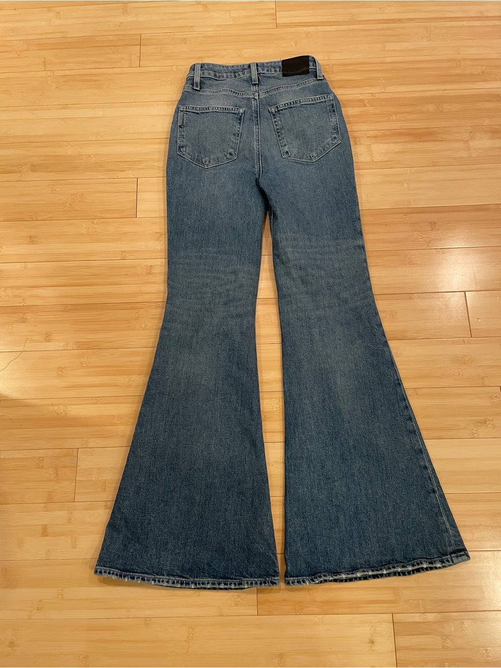 PAIGE High-Rise Flare Jeans in Medium Blue with Distressed Knees - Picture 3 of 7